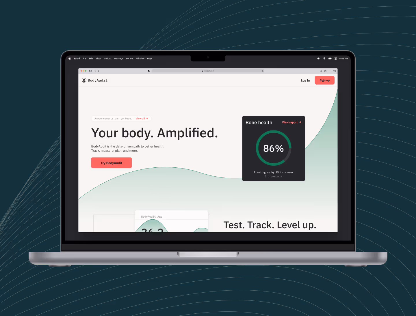 A laptop shows the BodyAudit marketing site landing page