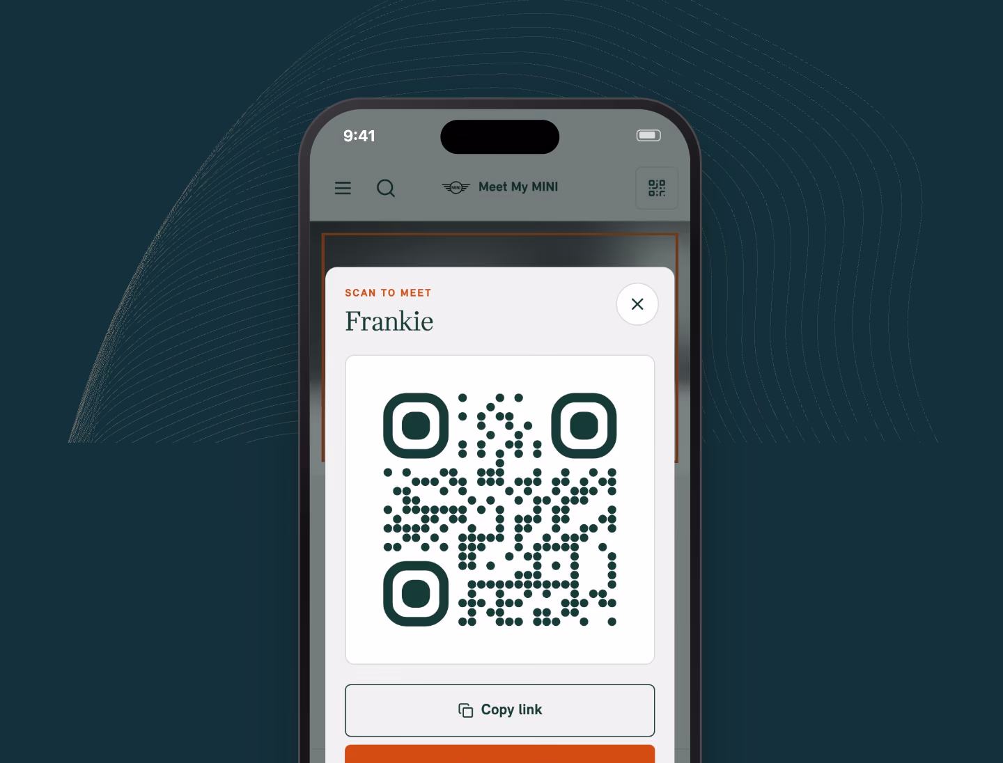 A phone shows the QR code a visitor scans to meet a car named Frankie