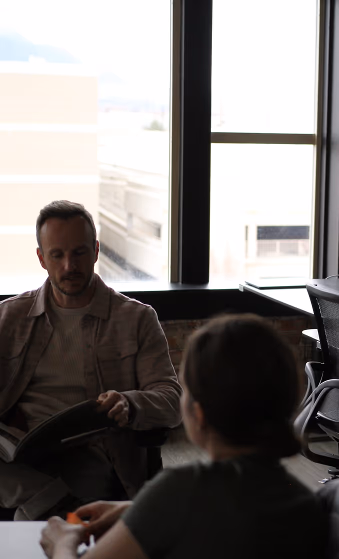 HQ team working with a client